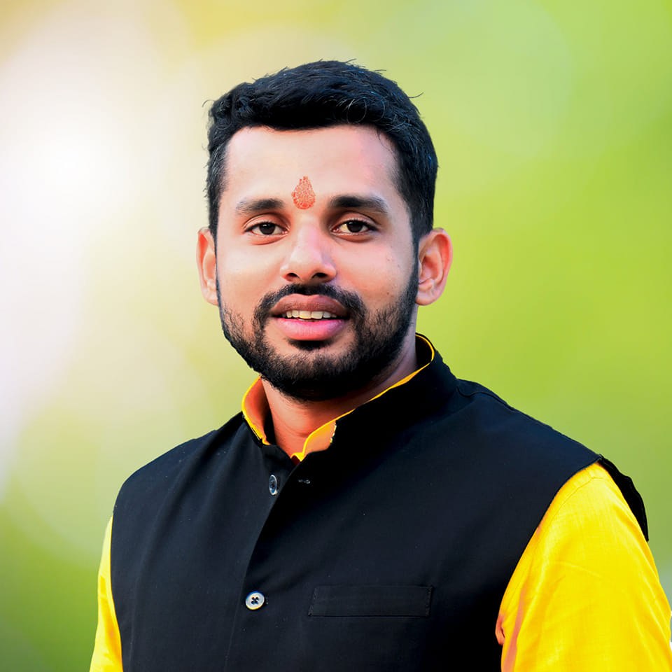 Portrait of Divyanshu Bhardwaj, an Indian politician, standing and visible till his stomach with background removed